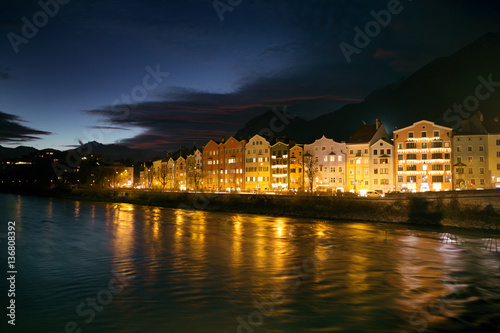 Night cityscape with river in the Innsbruck city