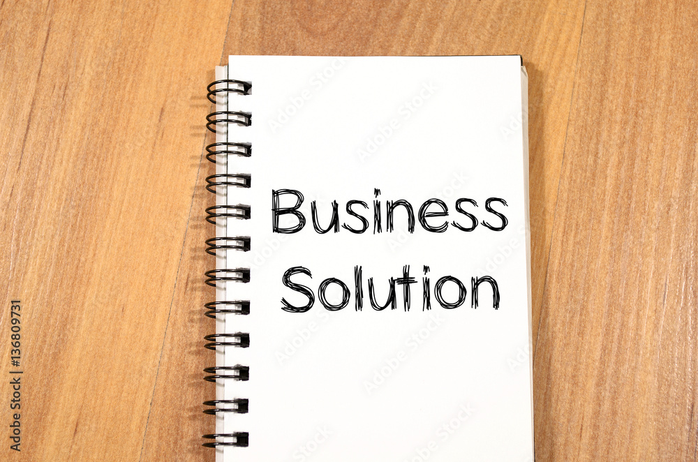Business solution concept on notebook Business solution concept on notebook