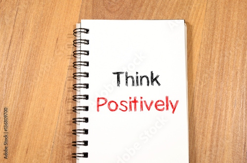 Think positively concept on notebook