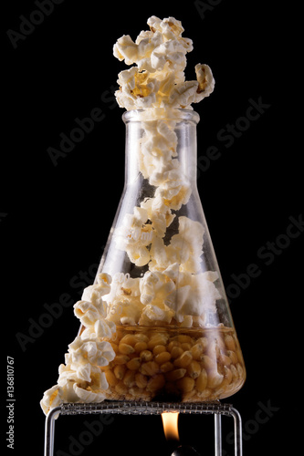 popcorn in oil and chemistry flask cooking