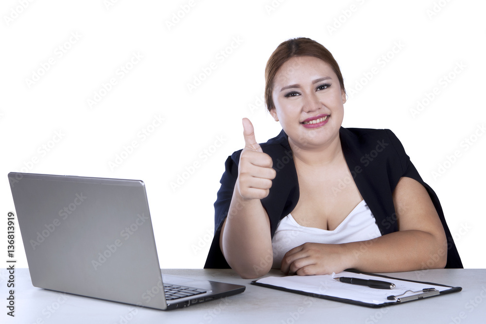 Businesswoman shows ok sign with thumb Businesswoman shows ok sign with thumb