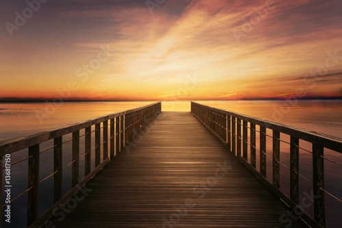 Bridge on calm sea at twilight time