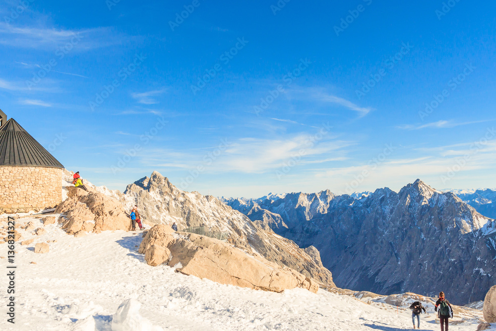 Group of Germany's seniors enjoying fresh air on Zugspitze peak 2962m high. Happy life in European Union, Zugspitze in Garmisch Partenkirchen, Germany