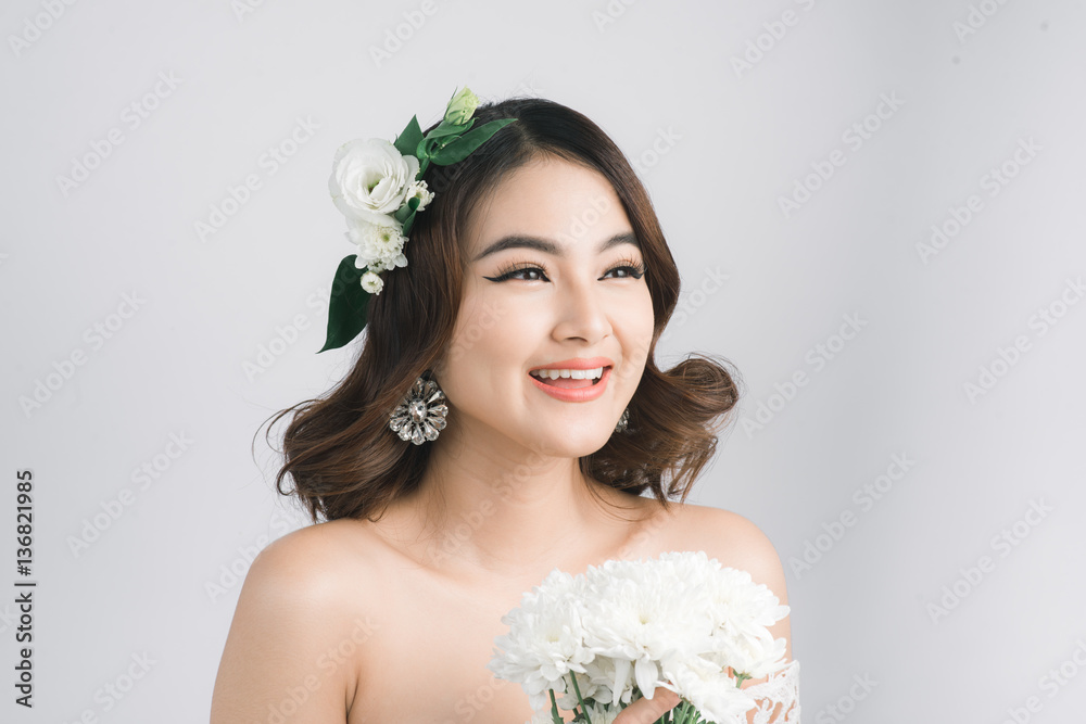 Beautiful asian woman bride on grey background. Closeup portrait Beautiful asian woman bride on grey background. Closeup portrait