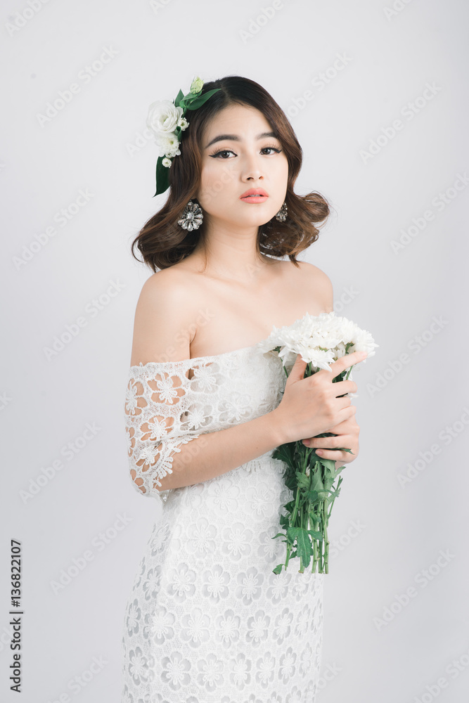 Beautiful asian woman bride on grey background. Beautiful asian woman bride on grey background.