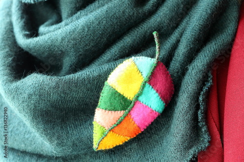 Print op canvas Original jewelry handmade brooch wood leaf from multi-colored pieces of felt on