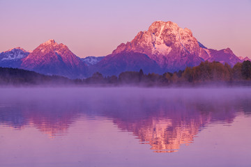 Acrylglasbilder Pflaumen Herbstsonnenaufgang mit Spiegelung in den Tetons  © natureguy