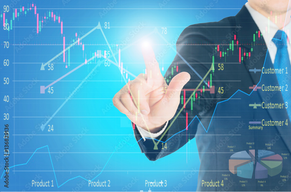 Businessman is pointing to report chart Businessman is pointing to report chart