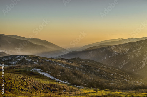 Fototapeta Naklejka Na Ścianę i Meble -  Beautiful landscape in the mountains with the sun at dawn. Mountains at the sunset time. Azerbaijan, Big Caucasus