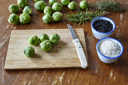 cutting sprouts to prepare healthy dinner photo