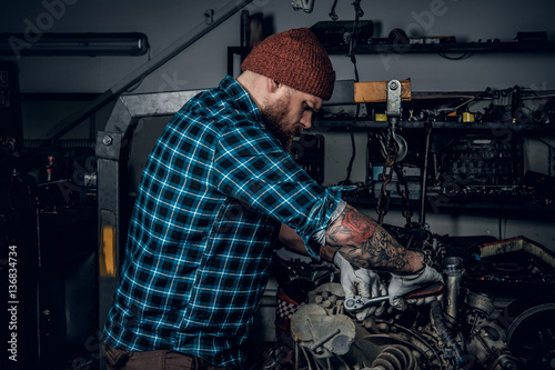 Mechanic man in a garage.