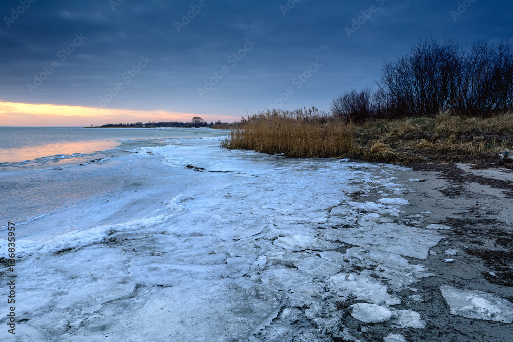 Winter landscape on the Baltic Sea. Cold winter evening in Jastarnia. Poland. Winter landscape on the Baltic Sea. Cold winter evening in Jastarnia. Poland.