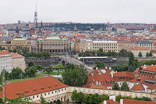 Classic cityscape in Prague, with red tile roofs.