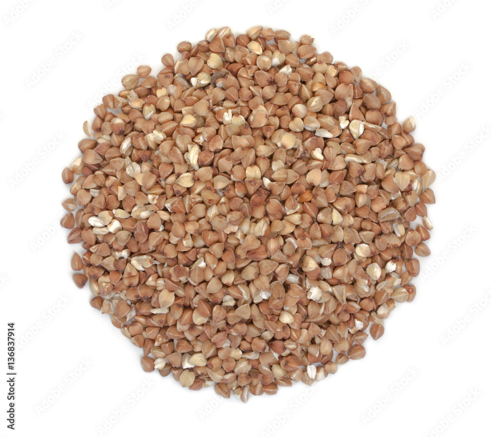 Grains of buckwheat isolated on a white background. Top view. Grains of buckwheat isolated on a white background. Top view.