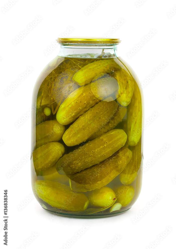 Homemade pickled cucumbers in glass jar. Jar of canned cucumbers Homemade pickled cucumbers in glass jar. Jar of canned cucumbers