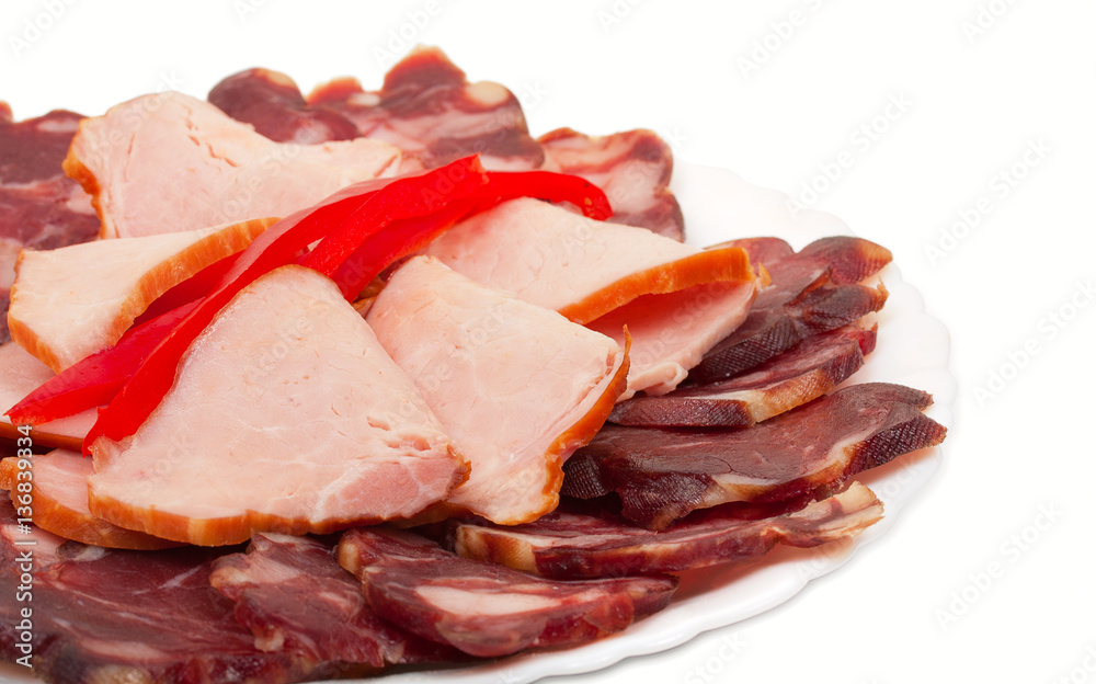Sliced homemade dry sausages and meat products, cured meat, with
