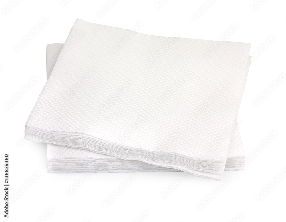 Heap of white paper napkins isolated on white background, close-