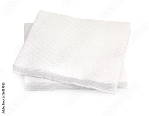 Heap of white paper napkins isolated on white background, close-