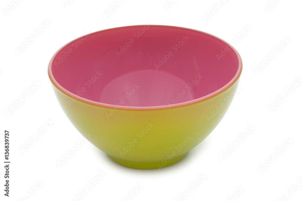 Raspberry and lime colors ceramic bowl isolated on white backgro Raspberry and lime colors ceramic bowl isolated on white backgro