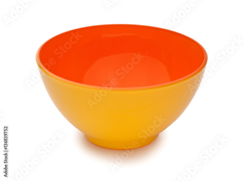 Orange and yellow colors ceramic bowl isolated on white backgrou