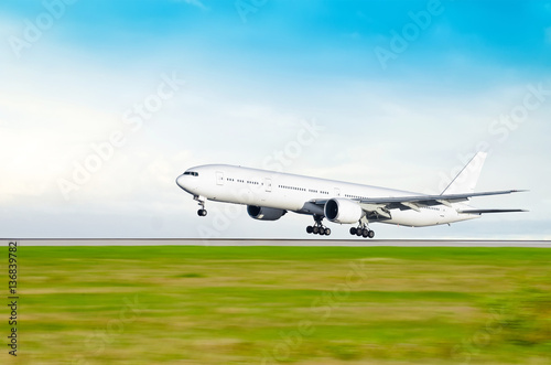 Airplane landing at the airport