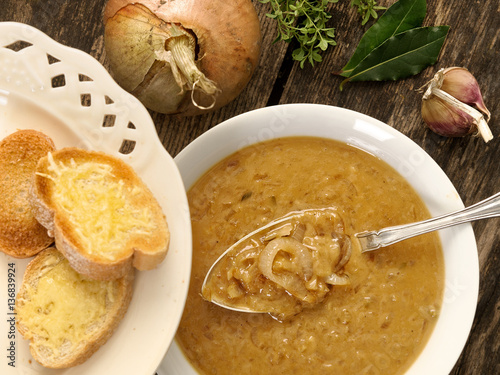 Onion soup with toasted baguette slices and cheese