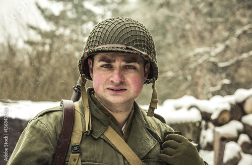A handsome young man in american military uniform of the Second World War period © oriolegin11