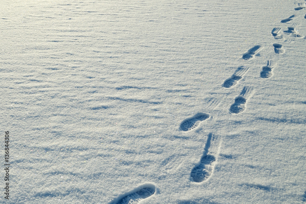 Human footprints in the snow.