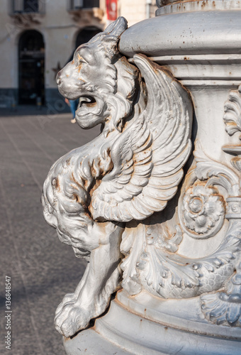 Statue of a Griffin on a street lamp in Catania, Sicily