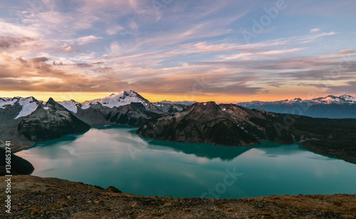 Sunset, lake and capped mountains, Garibaldi Provincial Park, British Columbia, Canada 