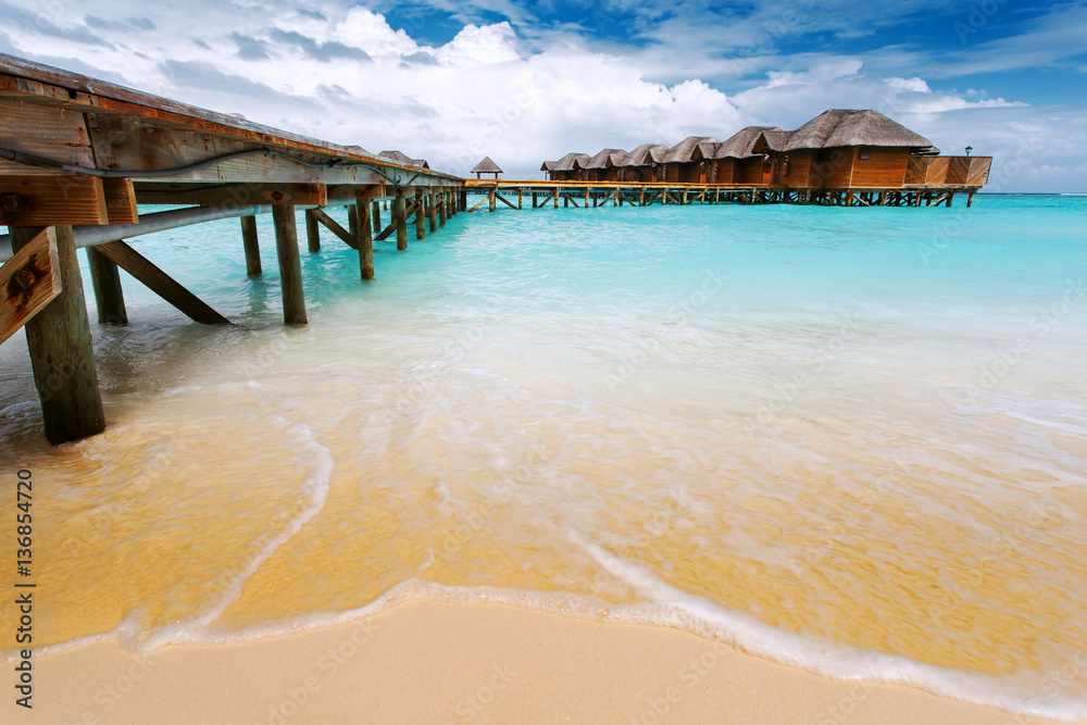 Water bungalows resort at islands. Indian Ocean, Maldives