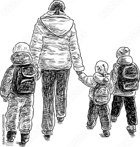 mother with her kids on a walk