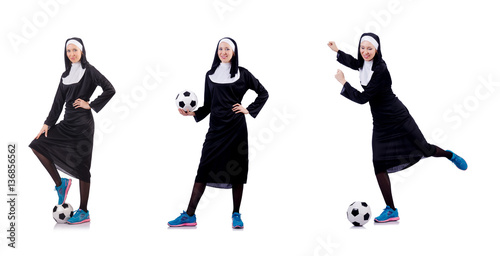 Pretty nun with football ball isolated on white