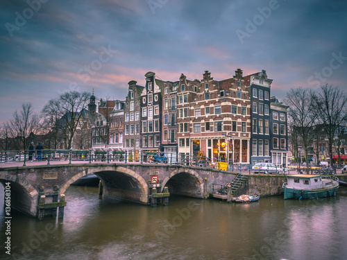 Canal houses sunset Amsterdam retro look