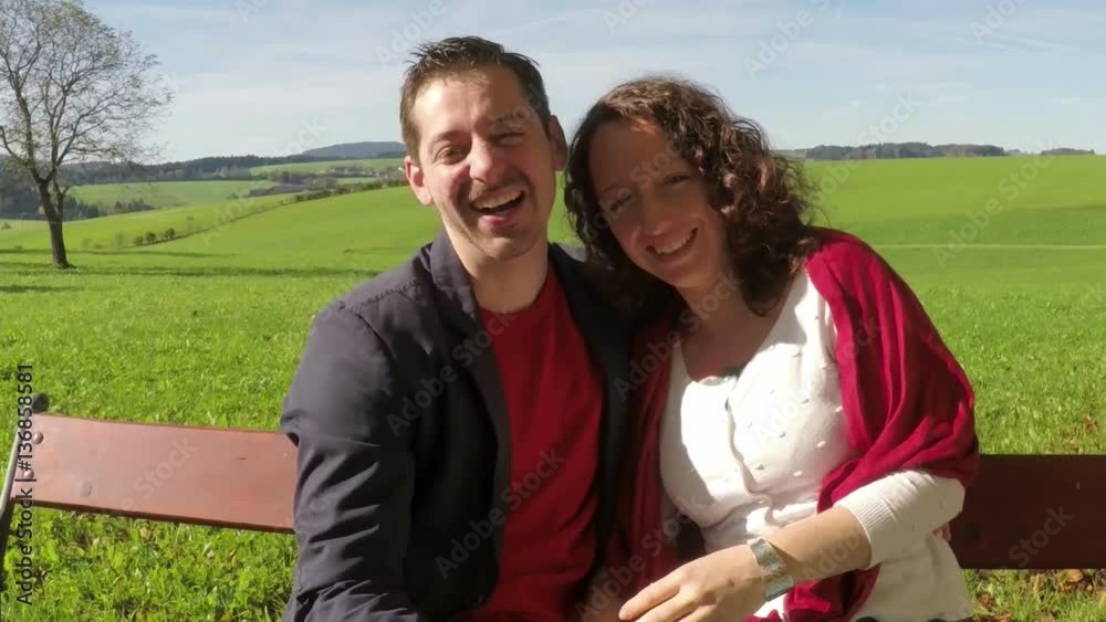 Romantic couple laughing in nature scenic, slow motion Romantic couple laughing in nature scenic, slow motion