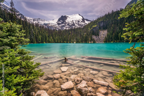 middle joffre lake, second of three turquoise colored, glacier fed lakes on a spectacular hike in the wilderness of British Columbia, Canada photo