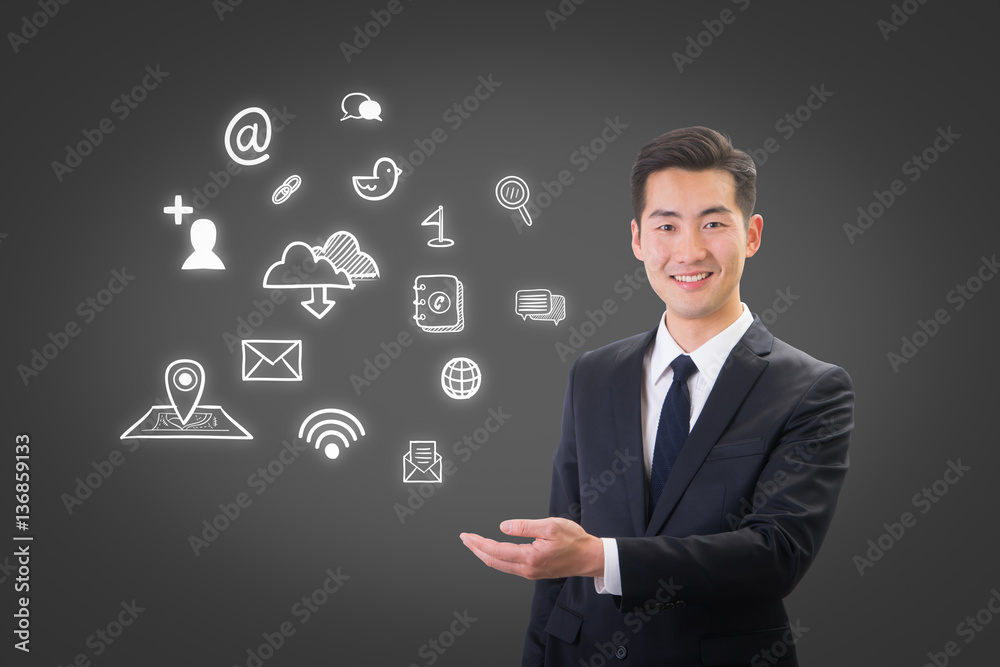 Young businessman showing social media & Internet icon concept Young businessman showing social media & Internet icon concept