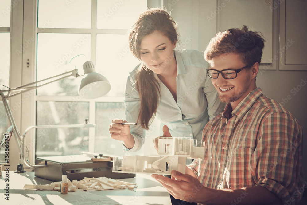 Obraz premium Confident team of engineers working together in a architect studio.