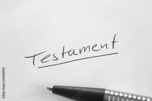 Testament handwritten word on white paper