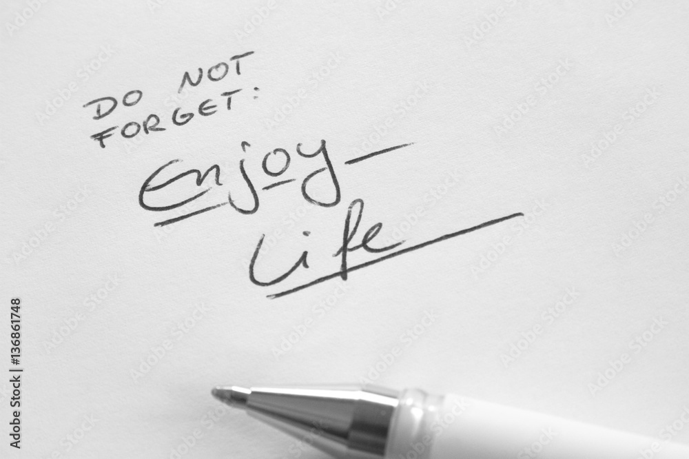 Fototapeta premium Enjoy Life, do not forget, handwritten phrase on white paper