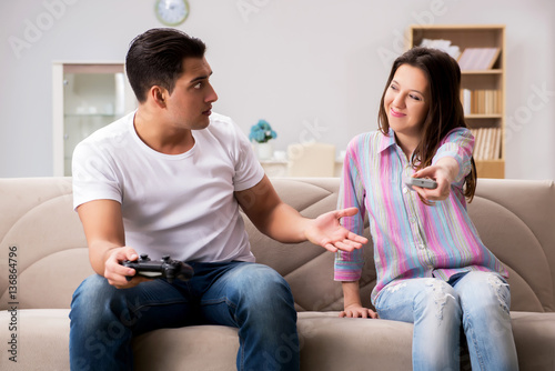 Young family suffering from computer games addiction