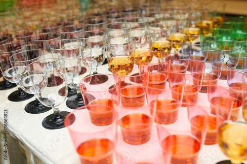 plastic cups of juice to the event