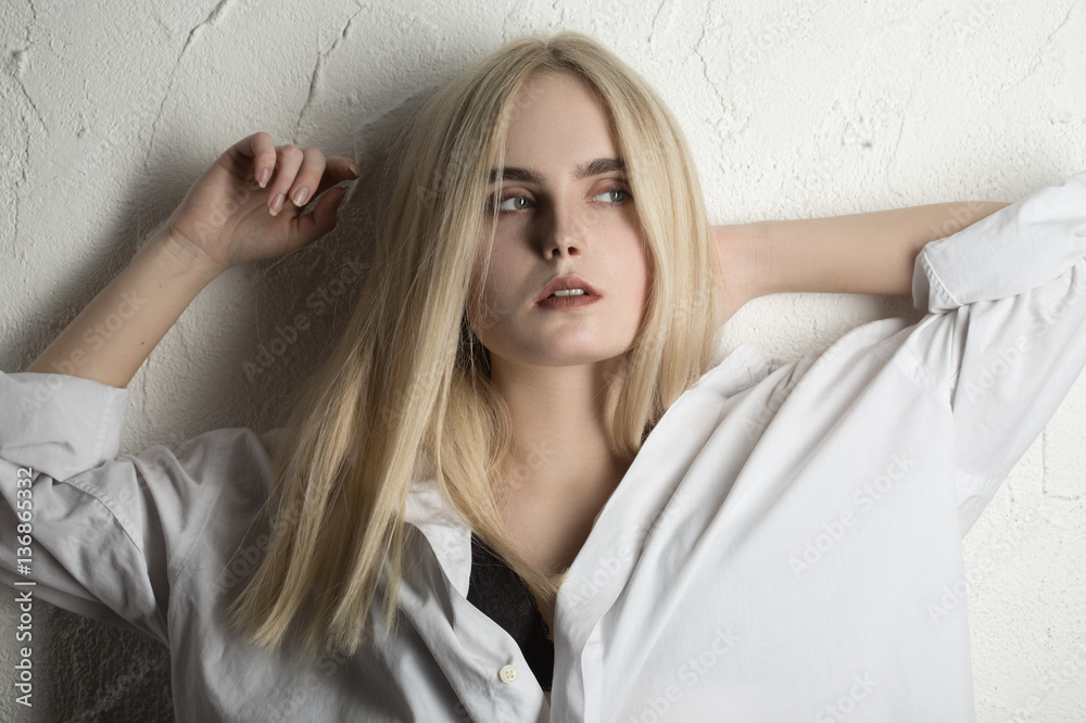 Fototapeta premium sensual sad blond girl looking at camera