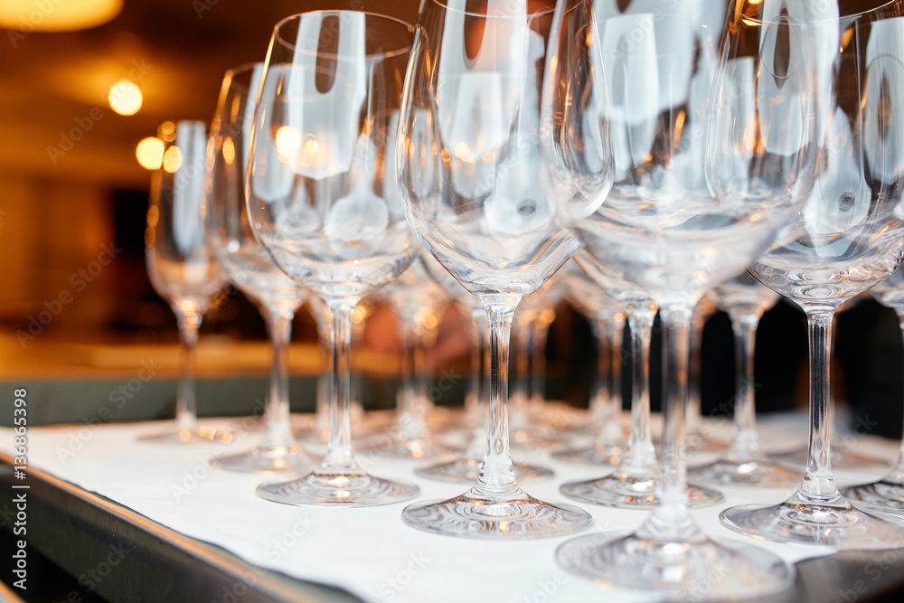 a lot of glasses of champagne on a table in a restaurant a lot of glasses of champagne on a table in a restaurant