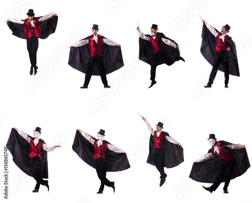 Man magician isolated on white