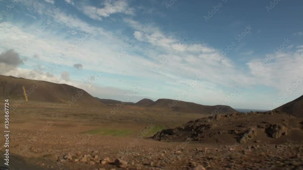 Natural landscape on shore of the Arctic Ocean in Greenland. Wilderness. Extreme tourism and travel in the cold polar north. Scenic coastline. Iceland. Natural landscape on shore of the Arctic Ocean in Greenland. Wilderness. Extreme tourism and travel in the cold polar north. Scenic coastline. Iceland.