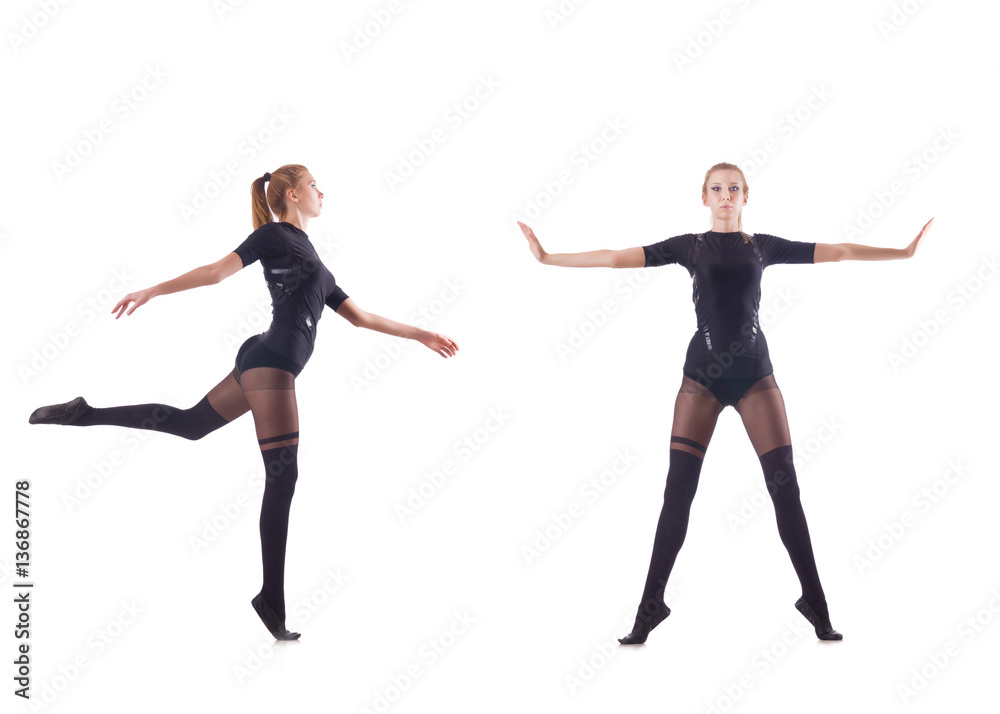 Young woman dancing on white background