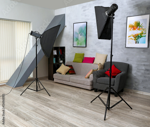 Empty photo studio with lig...