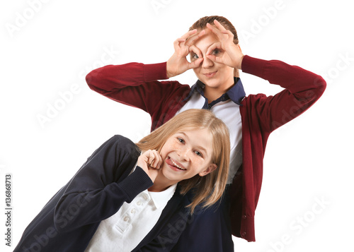 Two cute girls in school un...