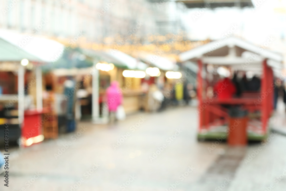 Blurred background of stalls at traditional Christmas fair